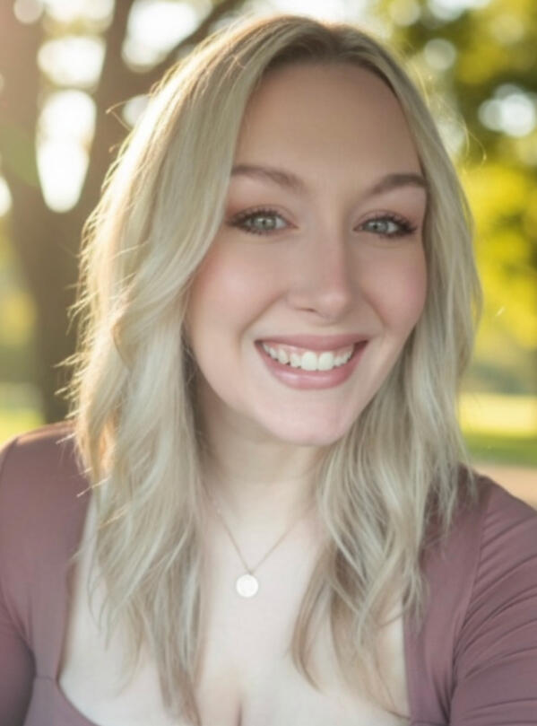woman smiling with blonde hair
